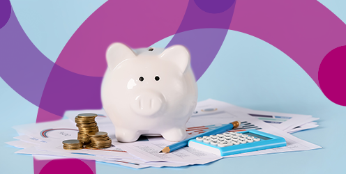 Piggy bank with savings and calculator